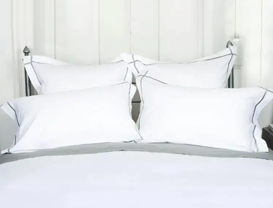 Was kann ich tun, wenn die schlichten Baumwoll -Satin -Blätter meines Hotels gelb werden und mit jeder Wäsche steifer werden?